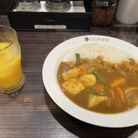 Vegetable curry and orange juice   at Coco ichibanya - Shinjuku Station in Tokyo