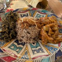Platter of 3 dishes: spinach, mujaddarah, bademjan. at Peace&Spice in Padua