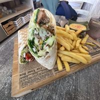 Falafel wrap with fries and hummus at Balance Bowl in Gzira