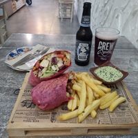 Tofulicious Wrap with fries and aragula pesto at Balance Bowl in Gzira