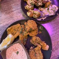 Starters: crispy potatos, fried oyster mushrooms  at Balance Bowl in Gzira