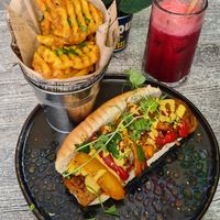 Filyz homemade seitan steak strips with roasted pepper & onions, drizzled with soft cheeze, served with potato waffles. at Balance Bowl in Gzira