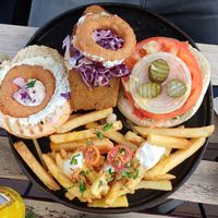 Burger opened up so delighted husband could discover all the treats inside! at Balance Bowl in Gzira