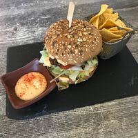 Nutty burger with cheese and nachos  at Balance Bowl in Gzira