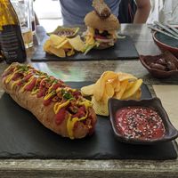 Look at that sausage at the top of my burger at Balance Bowl in Gzira