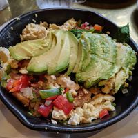 Greek skillet made vegan with scrambled tofu instead of egg. at Herms Inn in Logan