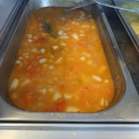 Vegan white beans with carrots and bell peppers.  at Salamanca Magenta Cafe & Bar in Salamanca