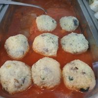 Light grain balls in tomato sauce.  at Salamanca Magenta Cafe & Bar in Salamanca