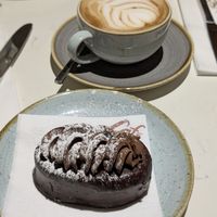 Vegan chocolate cake and oat flat white at Café Du Parc in Killarney