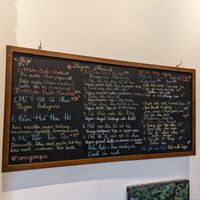 Daily menu on chalkboard at Mang's Mania in Ho Chi Minh City
