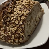 Pan De avena (40% integral: trigo germinado, avena, hojuelas de avena)  at El Pan De La Chola in Lima
