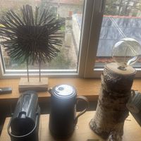 Nice art work in Flamingo room, a.o. wooden lamp at Villa La Vida in Egmond Aan Zee