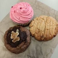Raspberry cupcake, Afghan biscuit, peanut butter cookie. All vegan at Moment in Christchurch