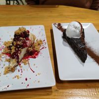 Cheesecake and chocolate cake with coconut ice cream at Roots & Rolls in Barcelona
