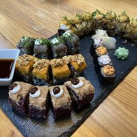 Sushi Tasting (imo the ‘say cheese’ on the top right were the BEST)  at Roots & Rolls in Barcelona