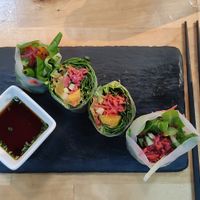 saigón roll : rice paper, pickled red cabbage, daikon and carrot, mango, cucumber, nut lettuce, mint, peanut sauce & ponzu  at Roots & Rolls in Barcelona