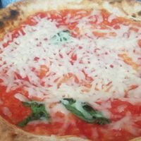 Sauce, basil and vegan cheese at Franco Manca in Bath