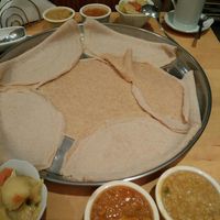 Injera with three different tastes of Ethiopian food at Abay Blue Nile Taste of Ethopia in Haarlem