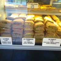 Prices , vgan organic sandwich is the one on the left at Les Frères Chapelier - Boulangerie Artisanale Bio in Toulouse