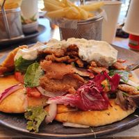 Chickpea yeeros with vegan tzatziki and naan bread at Seashells Healthy Living in Limassol