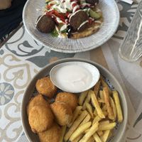 Falafel pitta and fish nuggets and fries   at Seashells Healthy Living in Limassol