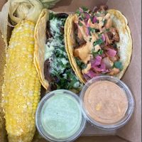 A special for Cinco de Mayo. Street corn with sauces was amazing. Bought 4 meals! at Essen Kitchen in Cincinnati