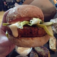 Takeaway burger, the "hearty boulette" at Aux Vivres - St Laurent in Montreal