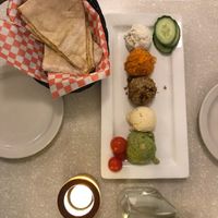 Starter of mixed spreads with “cheese” bread at Aux Vivres - St Laurent in Montreal
