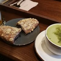Orange lime yoghurt, a black sesame pastry and green tea latte. at Doco - City Farm House Cafe in Busan