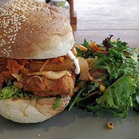 Tempeh & bakon  burger, with salad at I Am Vegan Babe in Canggu