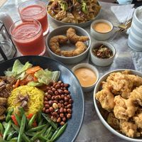 Indonesian flavours (bottom left), tempura popcorn (bottom right), crispy shrimp (centre), mini nachos (top)   at I Am Vegan Babe in Canggu