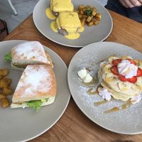 Pancakes, breakfast sandwich and eggs benedict at I Am Vegan Babe in Canggu