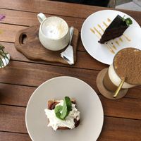 Soy latte, chocolate cake, cinnamon bun and cinnamon rudy at I Am Vegan Babe in Canggu