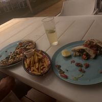 Pizza with vegan cheese, great chips, veggie gyros.   at Mangrove Hotel in Broome