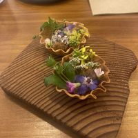 Tart using local foraged flowers and house made shells from old bread  at Hillside Kitchen & Cellar in Wellington