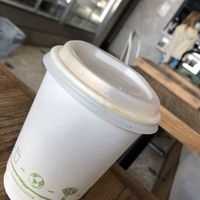 Compostable coffee container at Juicebaby in West London