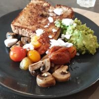 GF toast, smashed avo, vegan feta, tomatoes and mushrooms at Sweet Brew & Co in Darwin