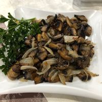 Sauteed mushrooms with onions (delicious, though a bit oiily) at Karimbek in Samarkand