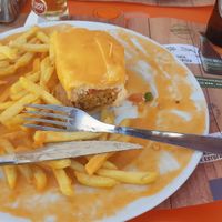 Half-eaten Francesinha at Pimenta Doce in Viana Do Castelo