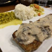 Seitan with mushroom sauce, vegetables, rice and peas   at Veget'Halles in Paris