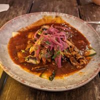 Vegetarian aguachile - mushroom, pickled onion, zucchini, amazing sauce and tostadas at Barba Negra in Holbox