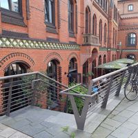 Access and outdoor seating at NENI in Hamburg