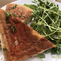 Smoked cashew and caramelised onion toastie with greens  at Dash Garden Cafe in Nottingham