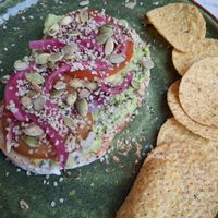 Toast met romige kaas en avocado at Happy Food and Health  in Rotterdam