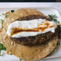 Tortilla Kebabi with rice and garlic sauce  at Happy Food and Health  in Rotterdam