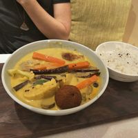 Halfe eaten vegan yellow curry and rice. at BMS Organics - Nanjing West in Shanghai