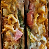 buffalo chicken and mac n cheese crunchwrap at Leguminati Vegan Eatery in Orlando
