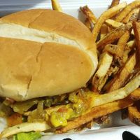 Impossible burger, added green chilis, no cheese, no mayo, with fries. The fries are seasoned and a bit salty at Chef Toddzilla in Roswell