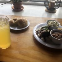 Oxtail, baked beans, potato salad, Mac and cheese, dinner rolls and mango lemonade. All good    at Binge Kitchen in San Antonio