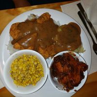 Deep South with candied yams, mashed potatoes and fried corn at Binge Kitchen in San Antonio